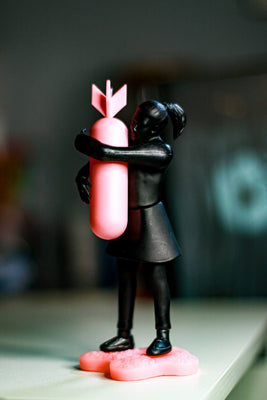 Bomb Hugger By Apologies to Banksy